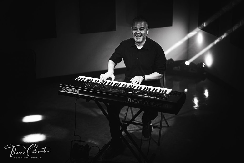 Manuele Montesanti performing live at the piano and keyboards